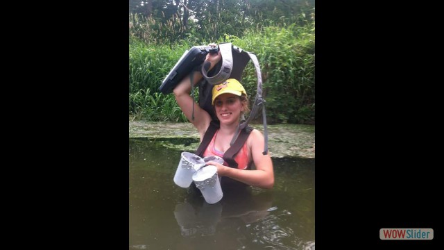 Sampling water in the Portage river, Ohio